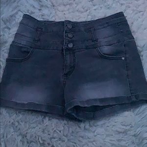 black and grey jean shorts.